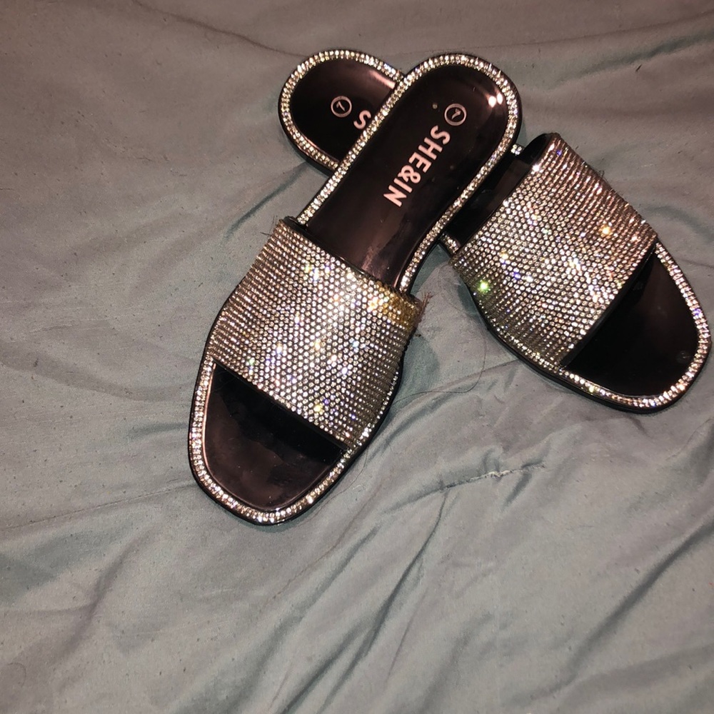 Sliver bling one the sandals and with black on it